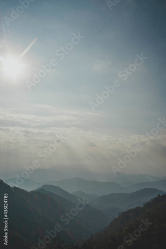 mountains under mist in the morning