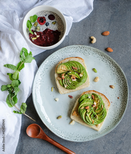 Homemade delicious and healthy meals / Avocado Toast with Mixed Berry Smoothie & Chia Seed Pudding / Light eat fortified with high nutritional value for clean living lifestyle