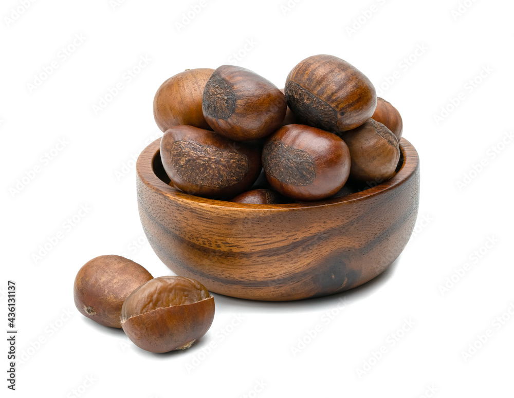 peeled roasted chestnut in wooden bowl isolated on white background peeled roasted chestnut in wooden bowl isolated on white background