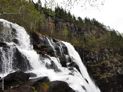 Beautiful view of the Skjervsfossen waterfall in Norway photo