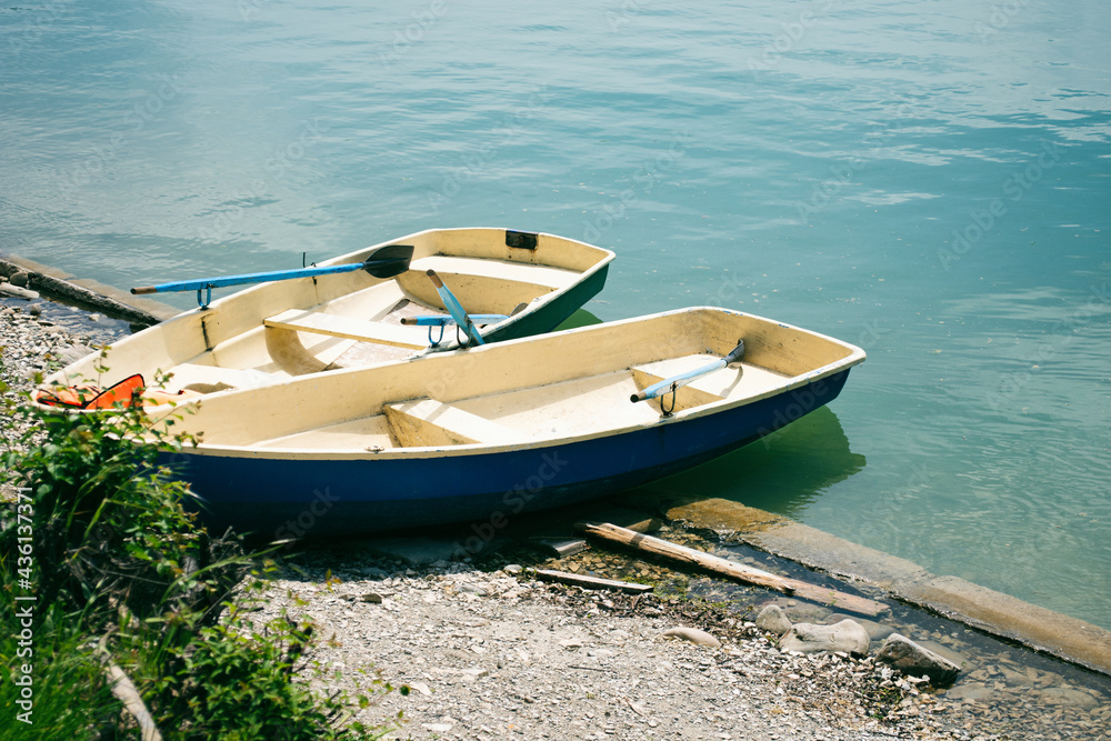 Two small boats on the lake.
