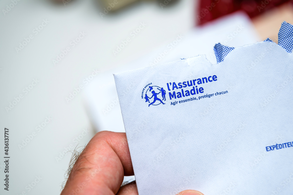 Paris, France - Apr 24, 2021: Pov male hand detail of open envelope from Assurance  Maladie translated as French Health insurance Stock Photo | Adobe Stock
