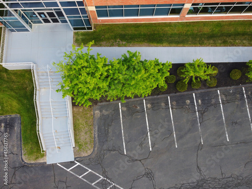 aerial view of parking lots in front of office building