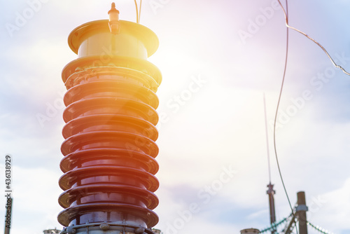 Detail of high voltage electric transformer generator power circuit breaker in a power substation.Nice sunny day.Closeup photo