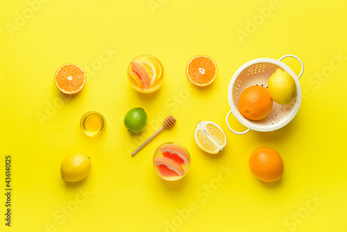 Fototapeta Naklejka Na Ścianę i Meble -  Composition with tasty cold lemonade and ingredients on color background