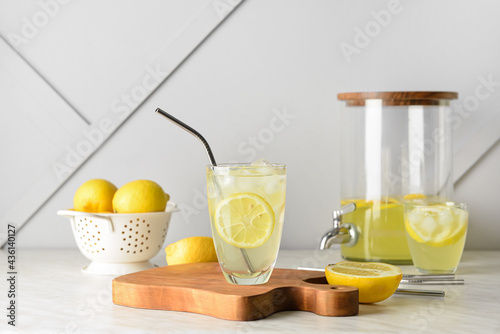 Composition with tasty cold lemonade on table
