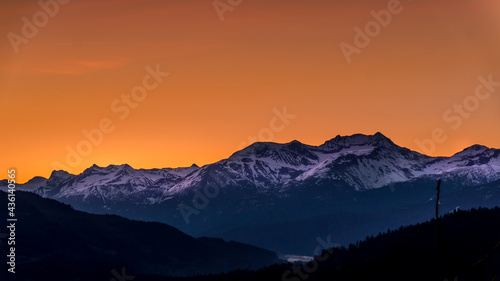 Sunrise over the Garibaldi Mountain Range with the northern most peak of Mt. Currie in the range in the distant. Viewed from Whistler RV Park plateau, British Columbia, Canada © hpbfotos
