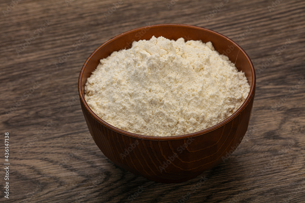 Wheat flour heap in the bowl Wheat flour heap in the bowl