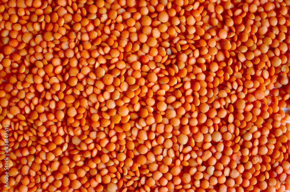 background of red lentils on white background
