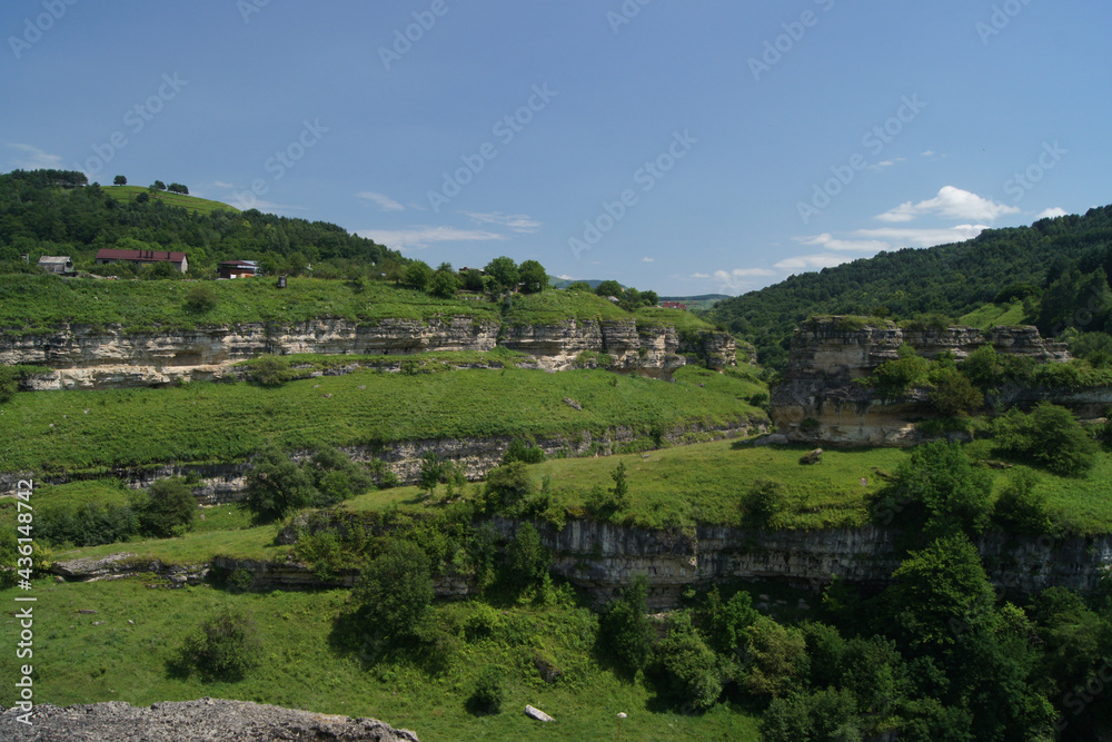 Fototapeta premium Road to the village in the mountains 