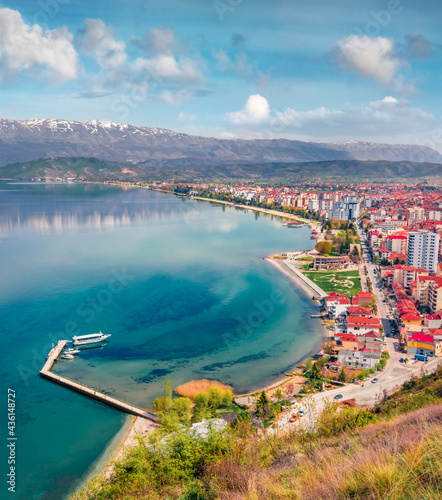 Aerial spring cityscape of Pogradec town. Colorful morning scene of Ohrid lake. Breathtaking landscape of Albania, Europe. Beauty of nature concept background.. © Andrew Mayovskyy