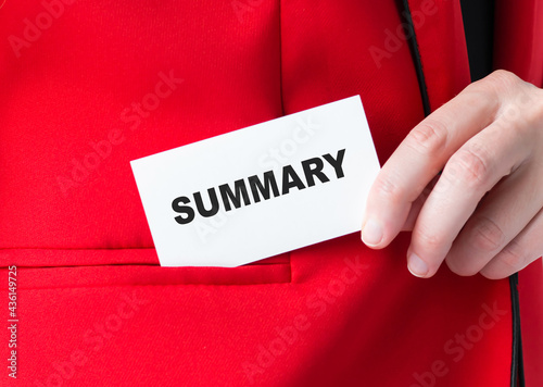 SUMMARY word on the card in the hands of a woman who puts a card with writing in her pocket