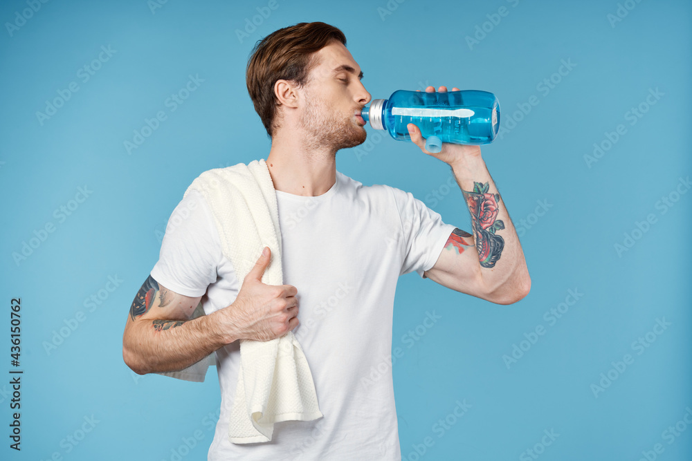 handsome man in white t-shirt sport water bottle health workout lifestyle handsome man in white t-shirt sport water bottle health workout lifestyle