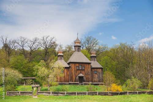 Ancient wooden church near the autumn forest