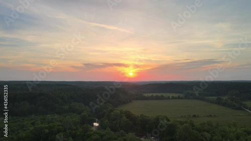 Flying toward a beautiful Tennessee sunset in the country photo