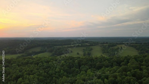 Slow aerial reveal of a beautiful Tennessee sunset photo