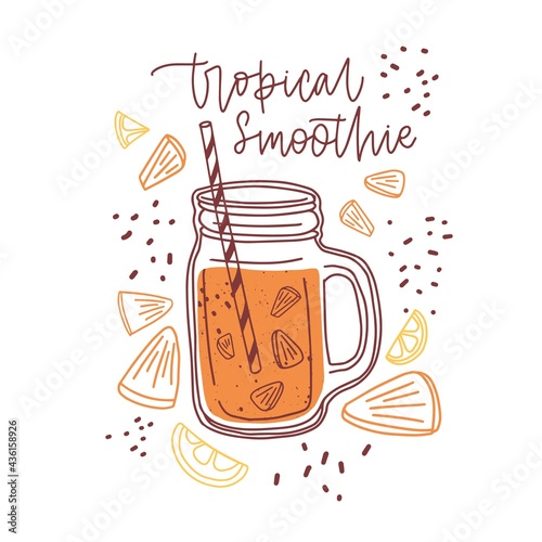 Glass jar of tropical smoothie with orange and lemon slices. Fresh healthy fr...