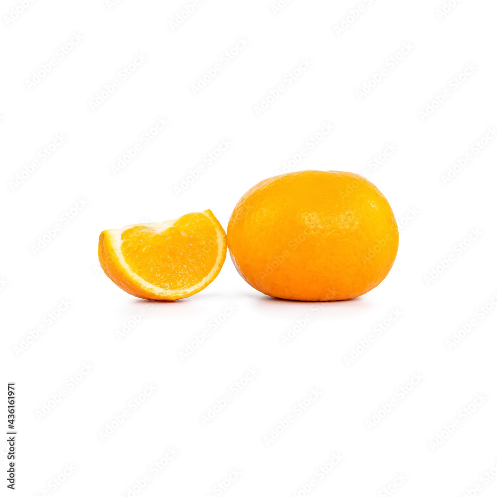 One tangerine or orange and one sliced orange on white background One tangerine or orange and one sliced orange on white background