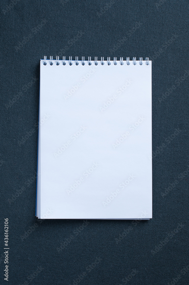 Blank notebook isolated on dark background mockup Blank notebook isolated on dark background mockup