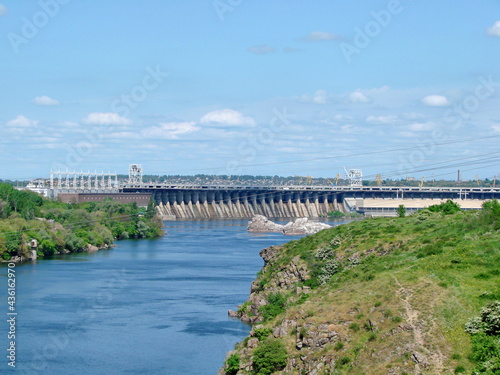 Panorama from the middle of the bridge of the main attraction of Zaporozhye - Dnieper hydroelectric power station.