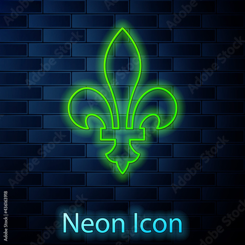 Glowing neon line Fleur De Lys icon isolated on brick wall background. Vector
