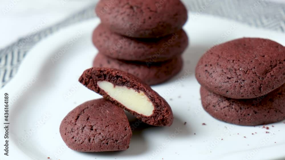 Crunchy red velvet cookies set on white cafe table. Crunchy red velvet cookies set on white cafe table.