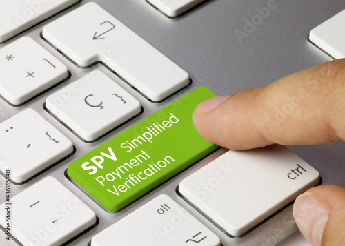 SPV Simplified Payment Verification - Inscription on Green Keyboard Key. photo