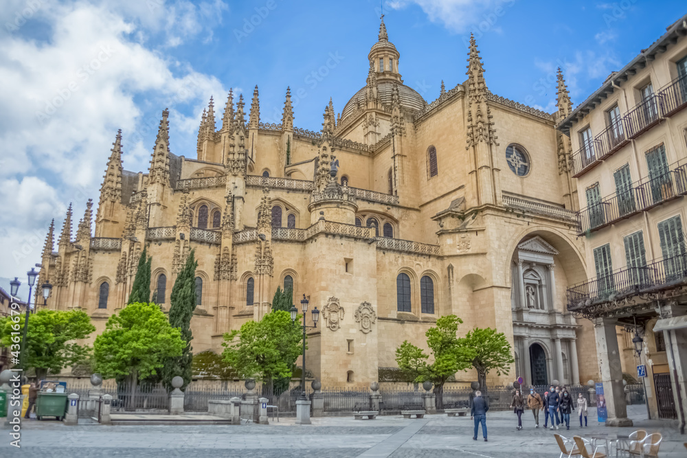 Majestic front view at the iconic spanish gothic building at the Segovia cathedral, towers and domes, downtown city