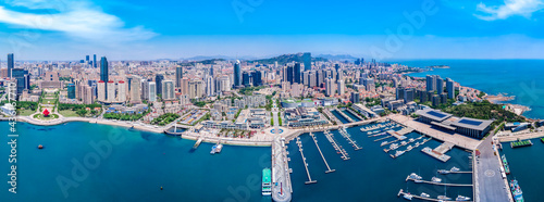 Aerial photography of architectural landscape skyline along Qingdao urban coastline