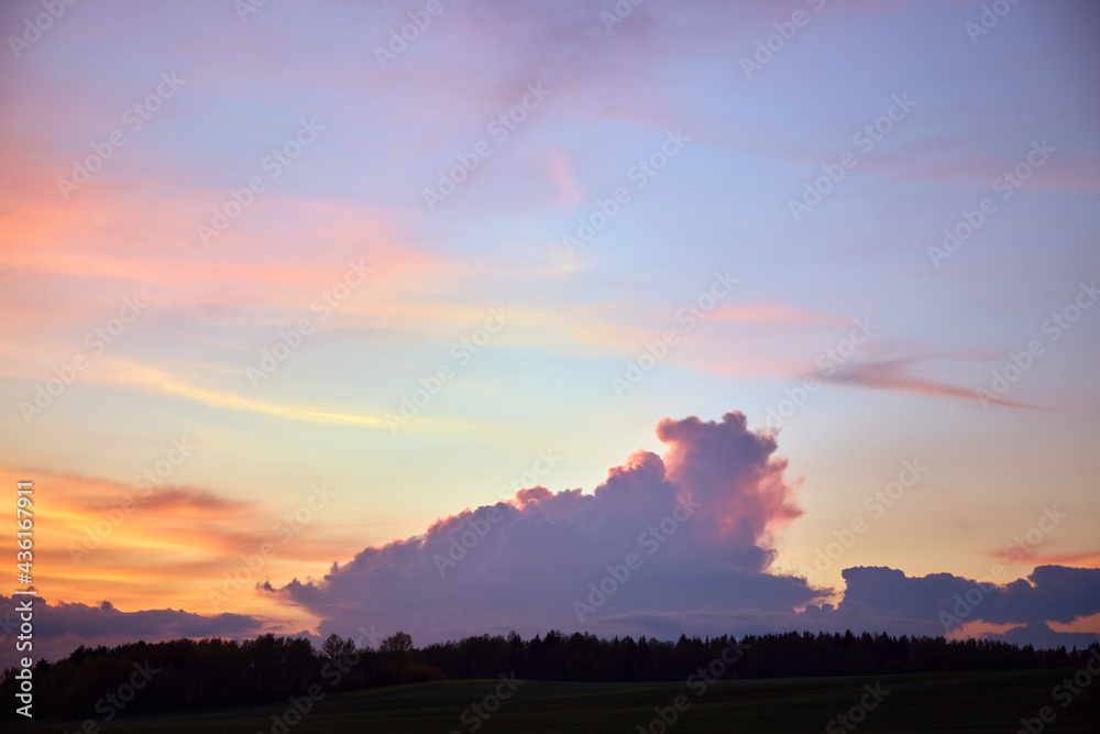 Abstract nature background. Pink, purple and blue cloudy sunset sky. Red cloudscape area. Bright mood wallpaper. Heaven. Colorful backdrop. Evening time. Springtime. Cumulus clouds. Summer season