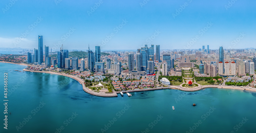 Aerial photography of architectural landscape skyline along Qingdao urban coastline