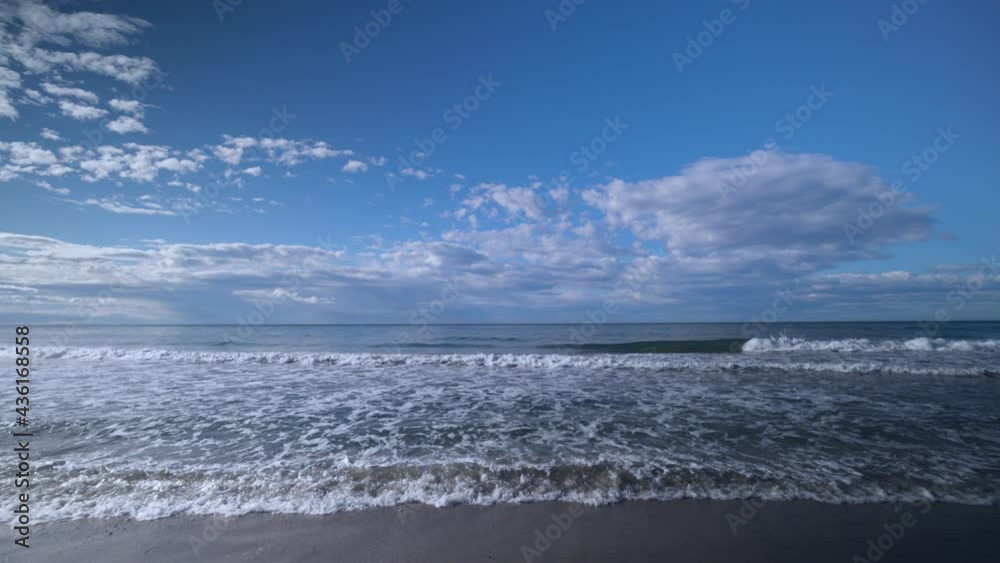 A beach and sea in the morning
