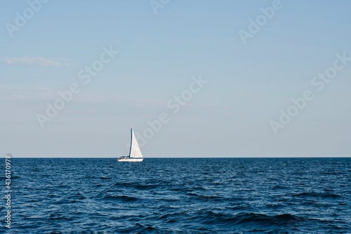 sailing in the blue sea. sailing on the sea. sailboat on the sea. 