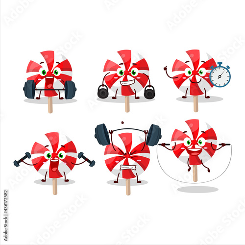 A healthy red white peppermint lolipop cartoon style trying some tools on Fitness center