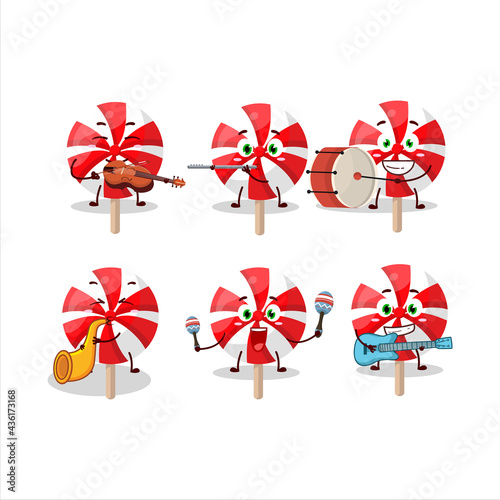 A red white peppermint lolipop Magician cartoon character perform on a stage