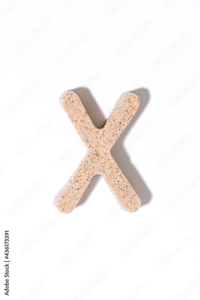 Letter X of the sand isolated in white. summer concept. alphabet. Letter X of the sand isolated in white. summer concept. alphabet.