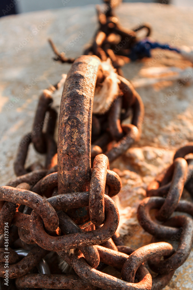 Rusty chains in the dock in Spain Rusty chains in the dock in Spain