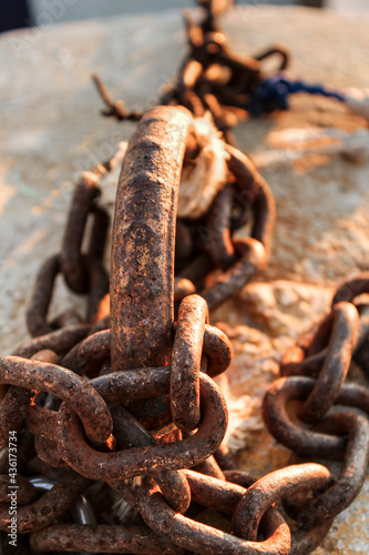 Rusty chains in the dock in Spain