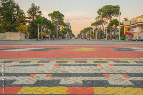 TIRANA, ALBANIA: A beautiful ornament with decorative elements is located on the asphalt.