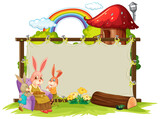 Blank banner in the garden with cute rabbits isolated