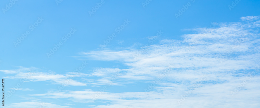 White cloud on beautiful clear blue sky in summer holiday indicates excellent environment of fresh, clean air, no pollution weather, and happy to breathe for good health