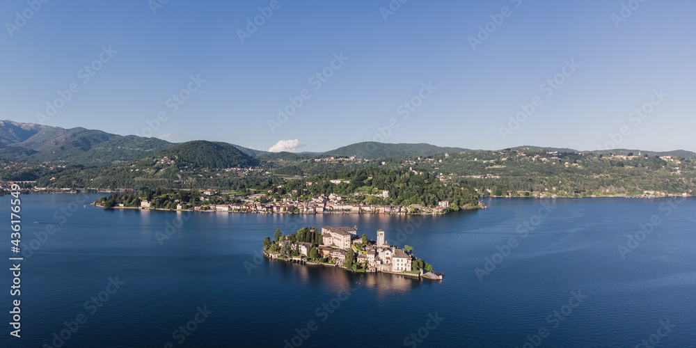 Aerial panoramic view over San Giulio Island on Lake Orta, Piedmont.
