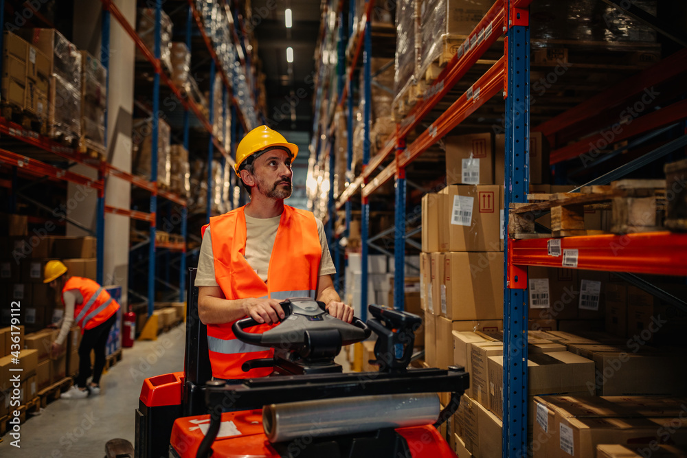 Logistics and transport worker in a warehouse