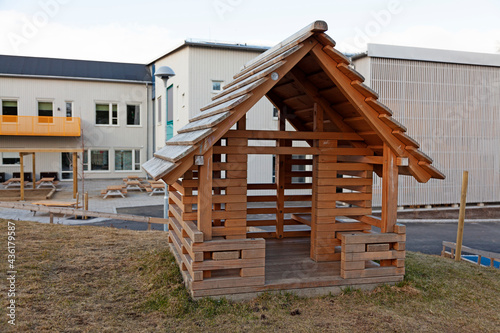 Umea, Norrland Sweden - May 3, 2021: small wooden playhouse at a school on Teg © Peter