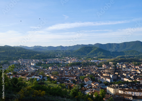 views of the city of olot, at dawn from the top of the Montsacopa volcano, in the province of girona, catalonia.