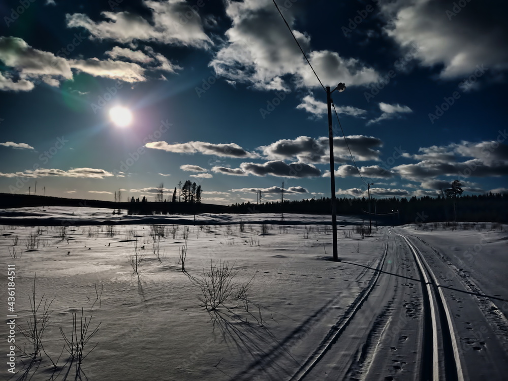 Illuminated ski trail in Norsjovallen in northern Sweden