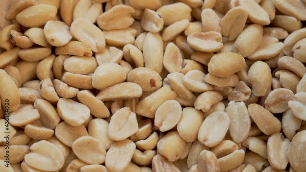 Roasted Peanuts, Healthy Nuts, Protein Food, Close-up, Rotation. Isolated Background of Roasted Peanuts. Vegan Food and Protein Nutrition. Roasted Peanuts, Healthy Nuts, Protein Food, Close-up, Rotation. Isolated Background of Roasted Peanuts. Vegan Food and Protein Nutrition.