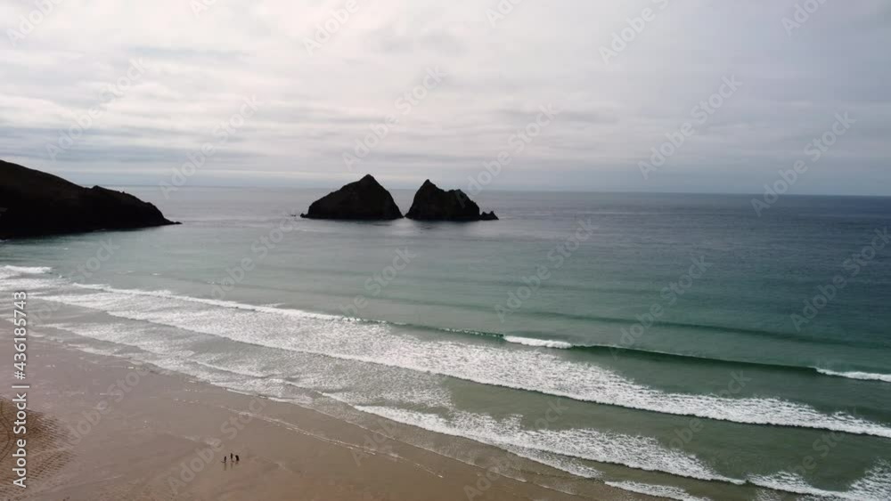Gull rock also known as carters rock at Holywell bay cornwall uk aerial drone Gull rock also known as carters rock at Holywell bay cornwall uk aerial drone