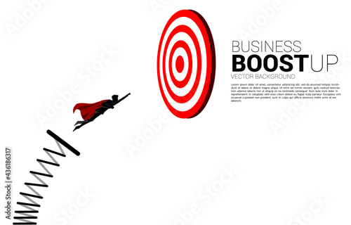 silhouette of businessman flying to target dartboard with springboard. Business Concept of targeting and customer.route to success.