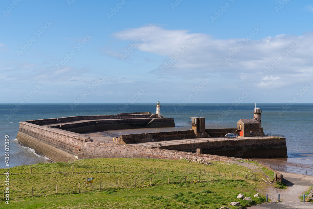 Whitehaven Cumbria England UK The West Pier Lighthouse and harbour wall